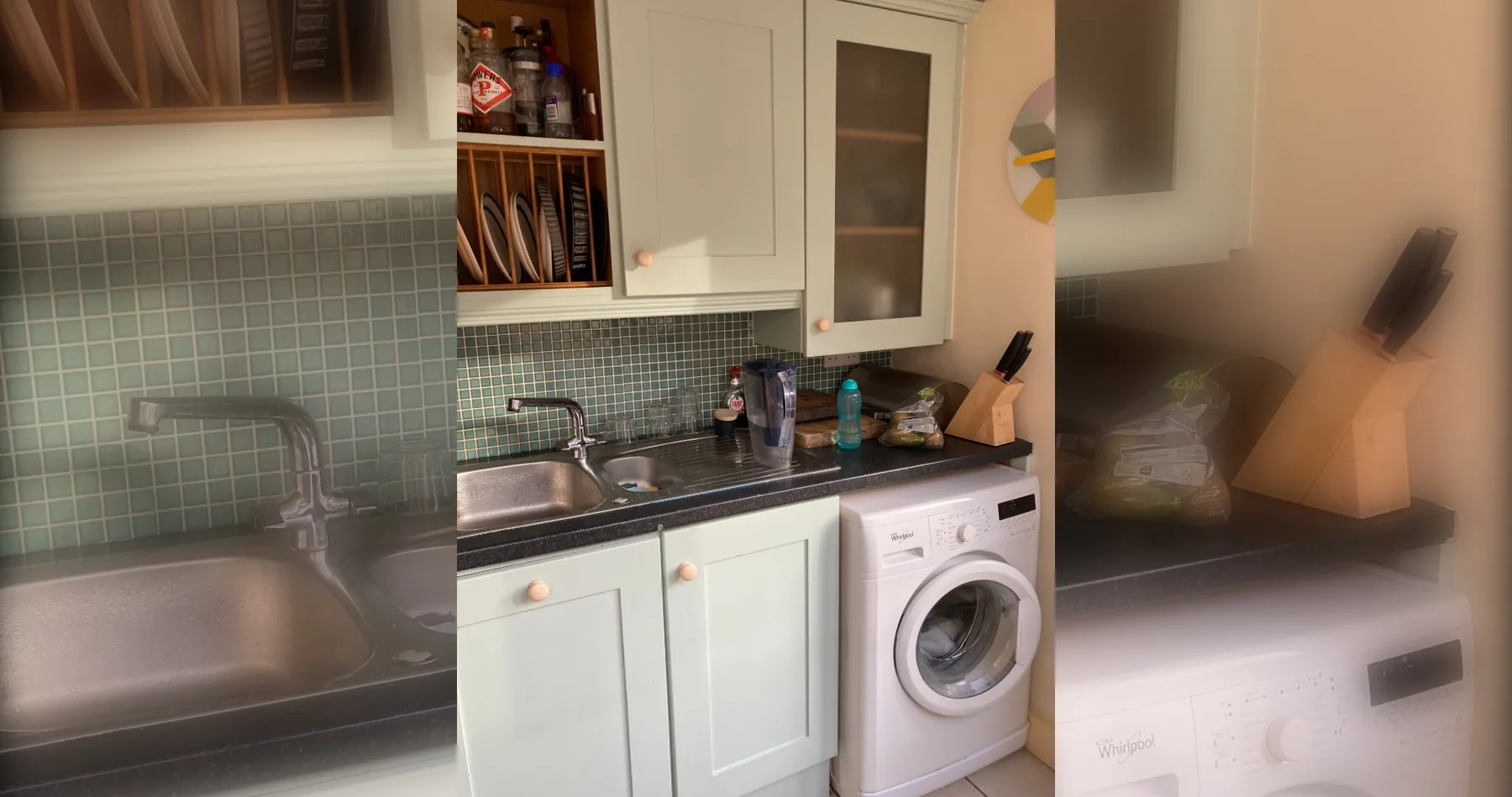 A compact kitchen area with a sink, cabinets, and a washing machine.
