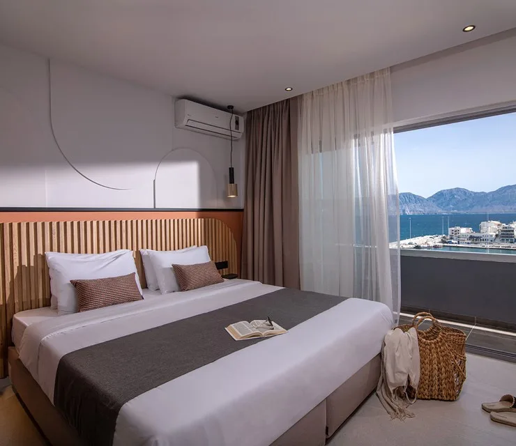 Habitación doble con cama de matrimonio o 2 camas y vistas laterales al mar