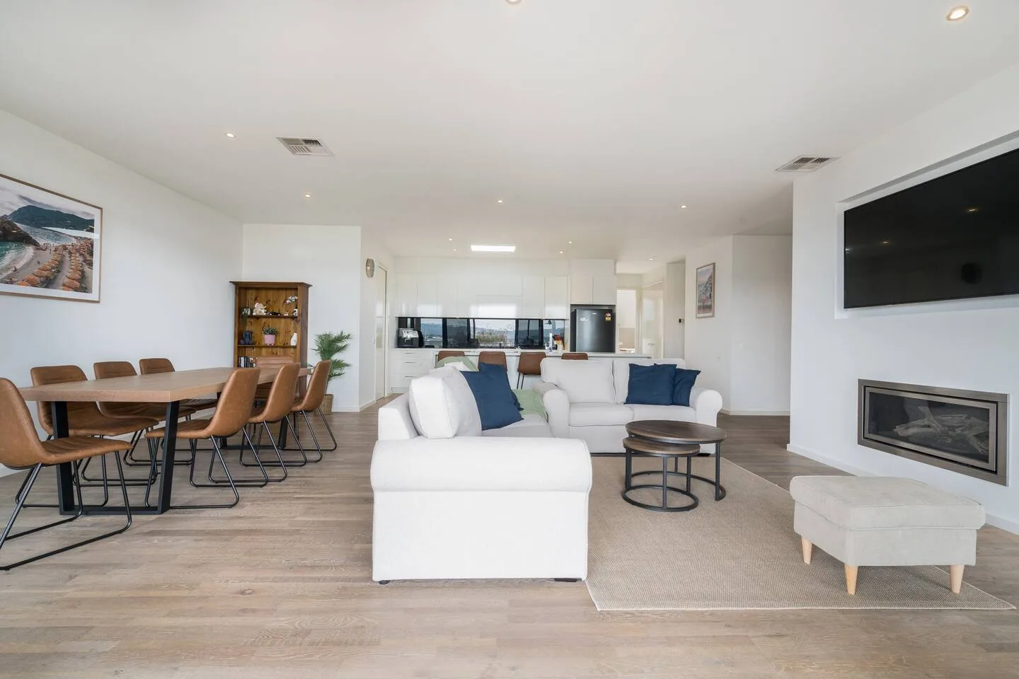 Gather your group for a memorable experience around the expansive dining table, or unwind and enjoy relaxation on the sofa by the indoor fireplace.