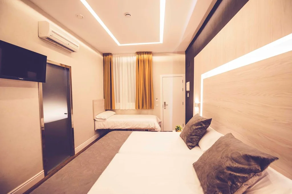 Habitación doble con una cama supletoria