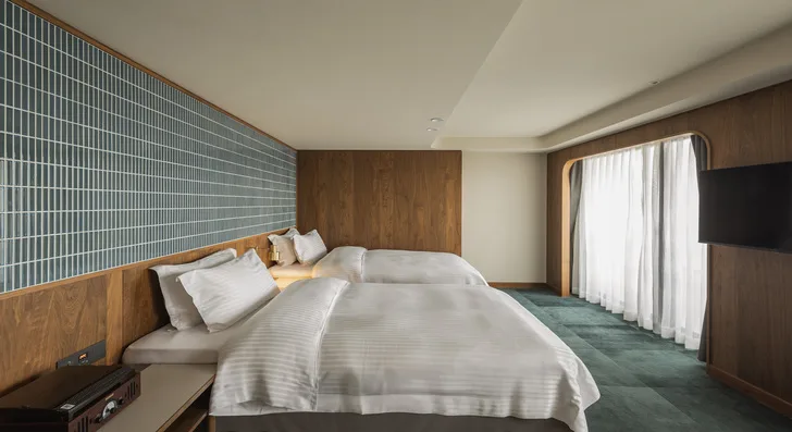 Habitación deluxe con dos camas y bañera