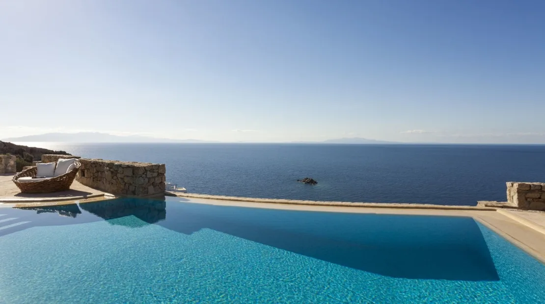 An infinity pool overlooks the sea.