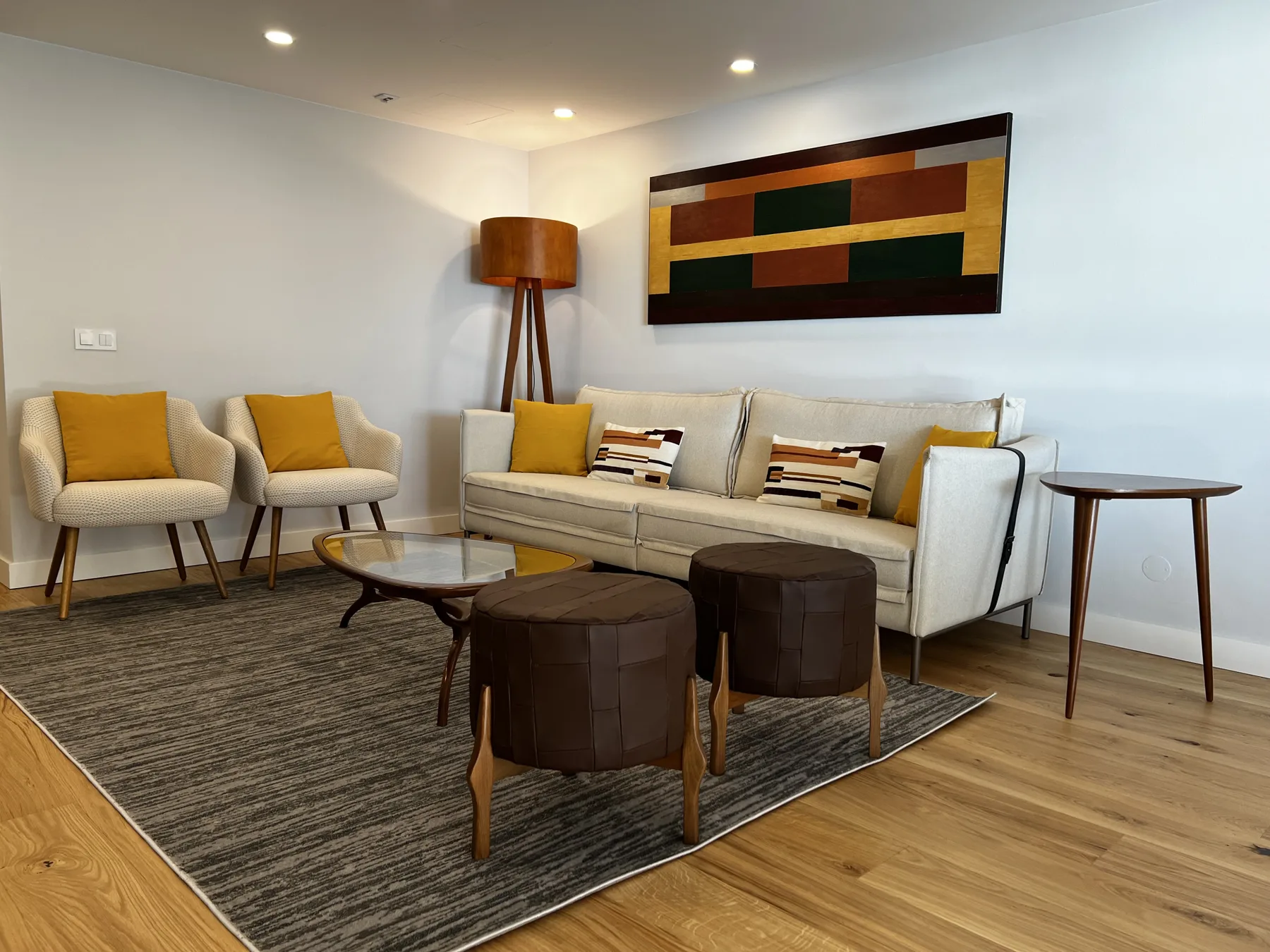 A living room with seating arranged around a low coffee table.