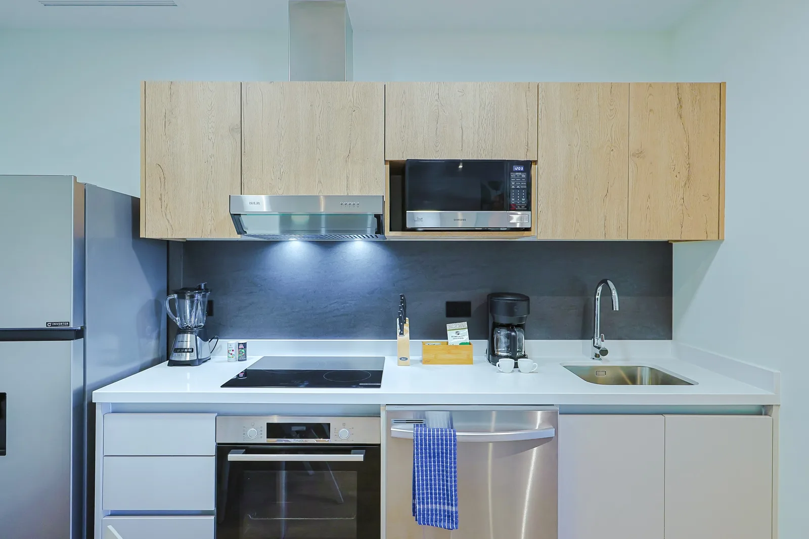 Your modern kitchen comes fully equipped with stainless steel appliances, sleek countertops