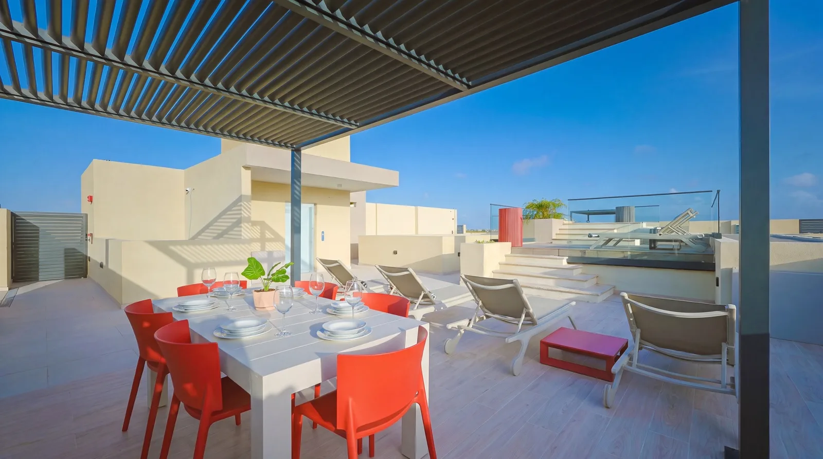 Dine al fresco beneath the pergola