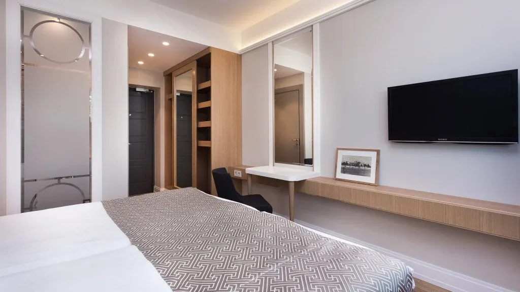 Room with a wide bed