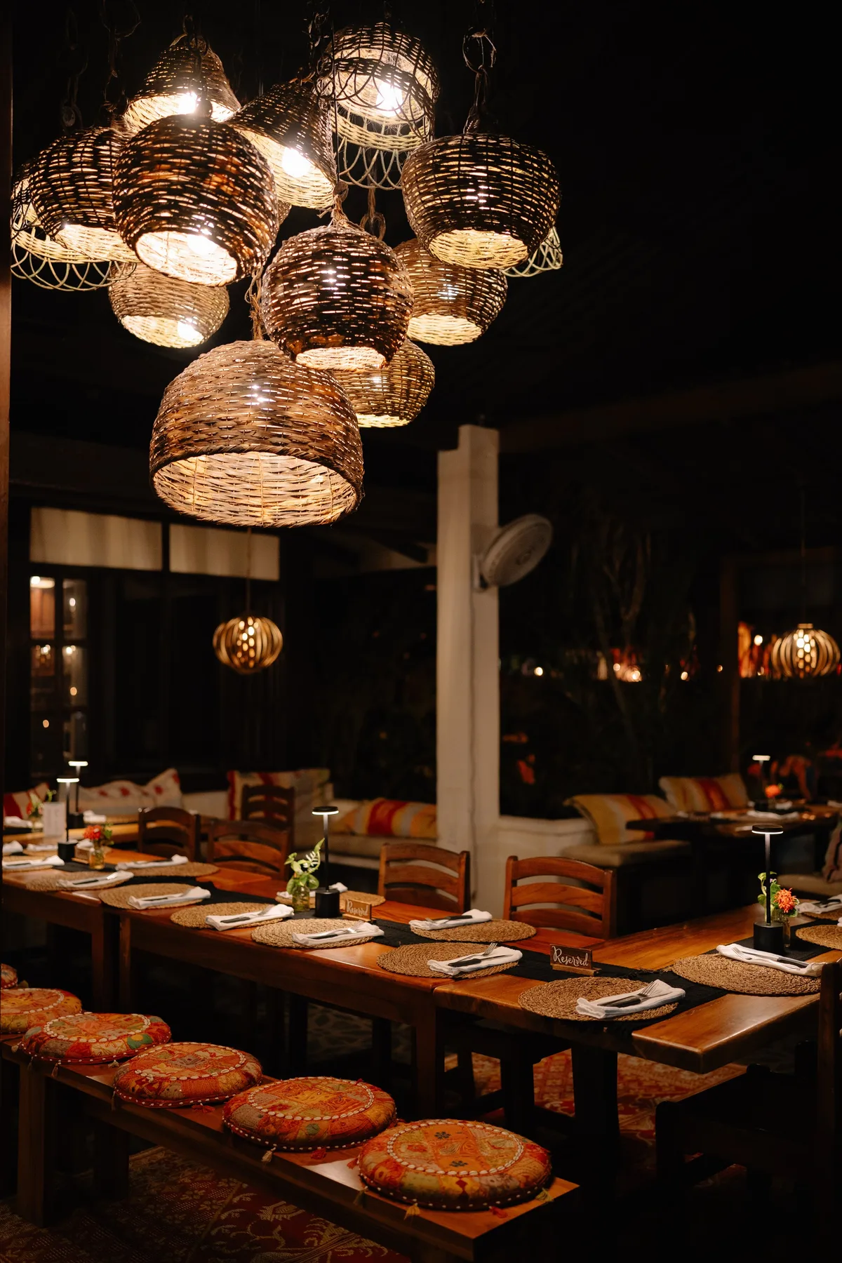 Interior of the restaurant with a long dining table.