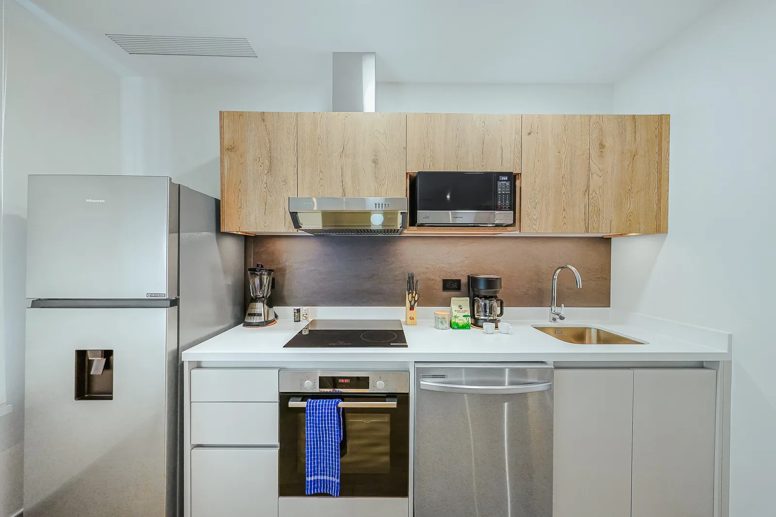Your fully equipped kitchen invites you to whip up fresh meals with modern appliances and ample counter space, making it easy to feel at home during your stay.
