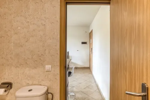 Interior passage leading to the apartment area