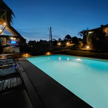 Hotel building beside the pool at night