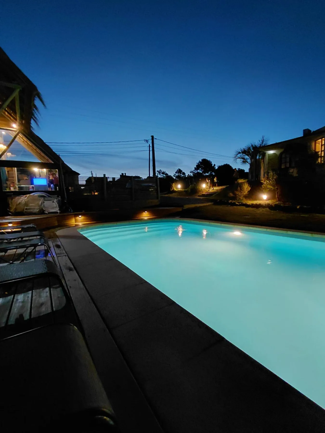 Hotel building beside the pool at night