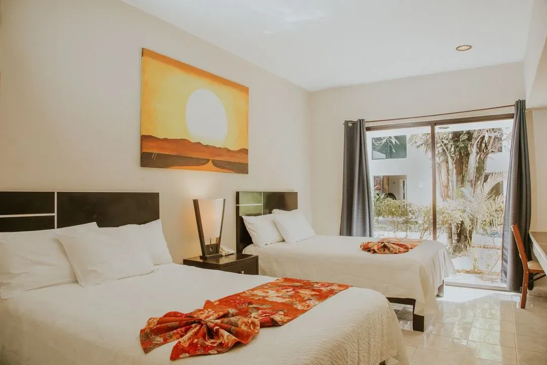 Hotel room with two beds.