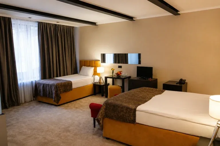 Gold room with two beds