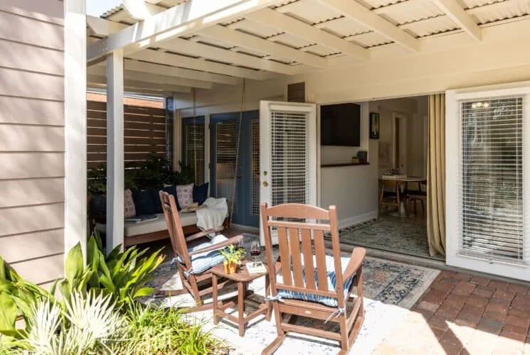 Covered patio with daybed swing and rocking chairs