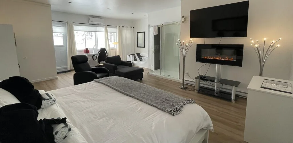 Private suite with king bed and double whirlpool bath