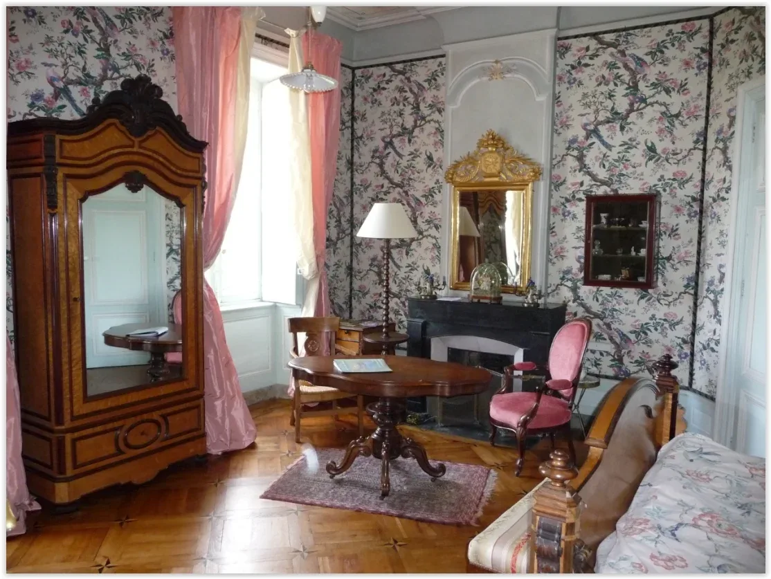 Les Perroquets room with original 1850 wallpaper and ceiling paintings