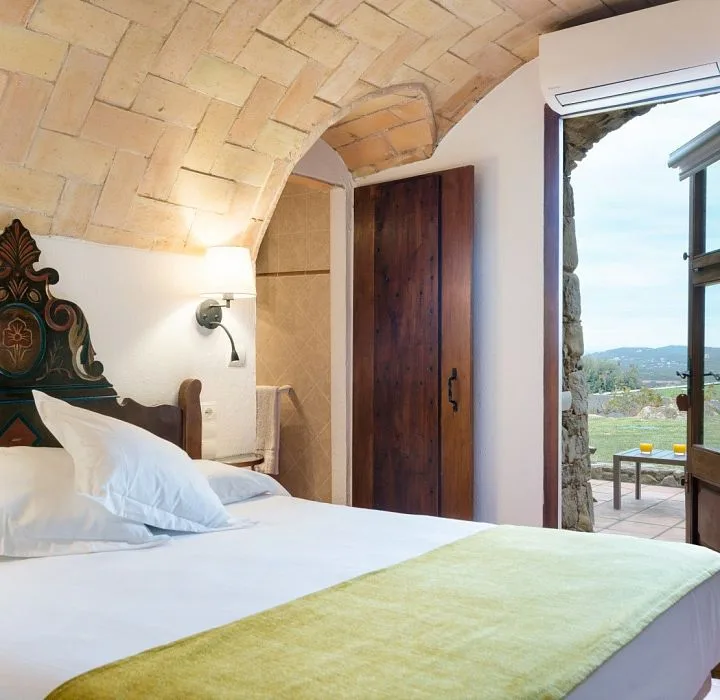 Habitación Masía Jardín y zona exterior