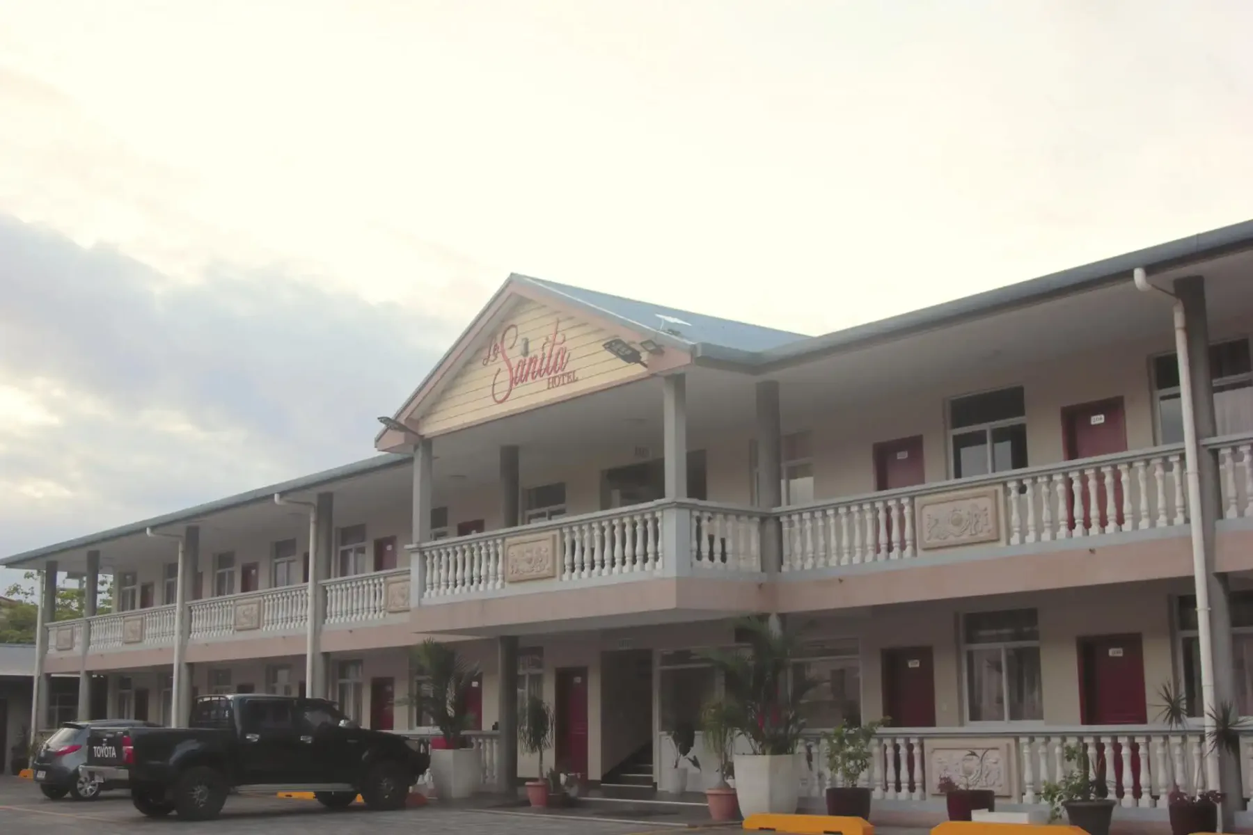 Hotel exterior viewed from the parking lot.