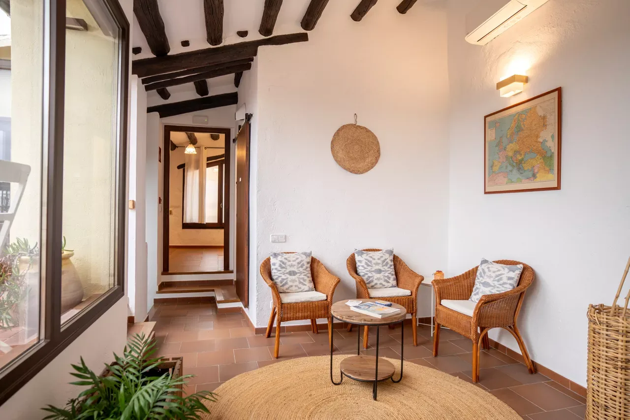 Resting area in a hallway at the hostal