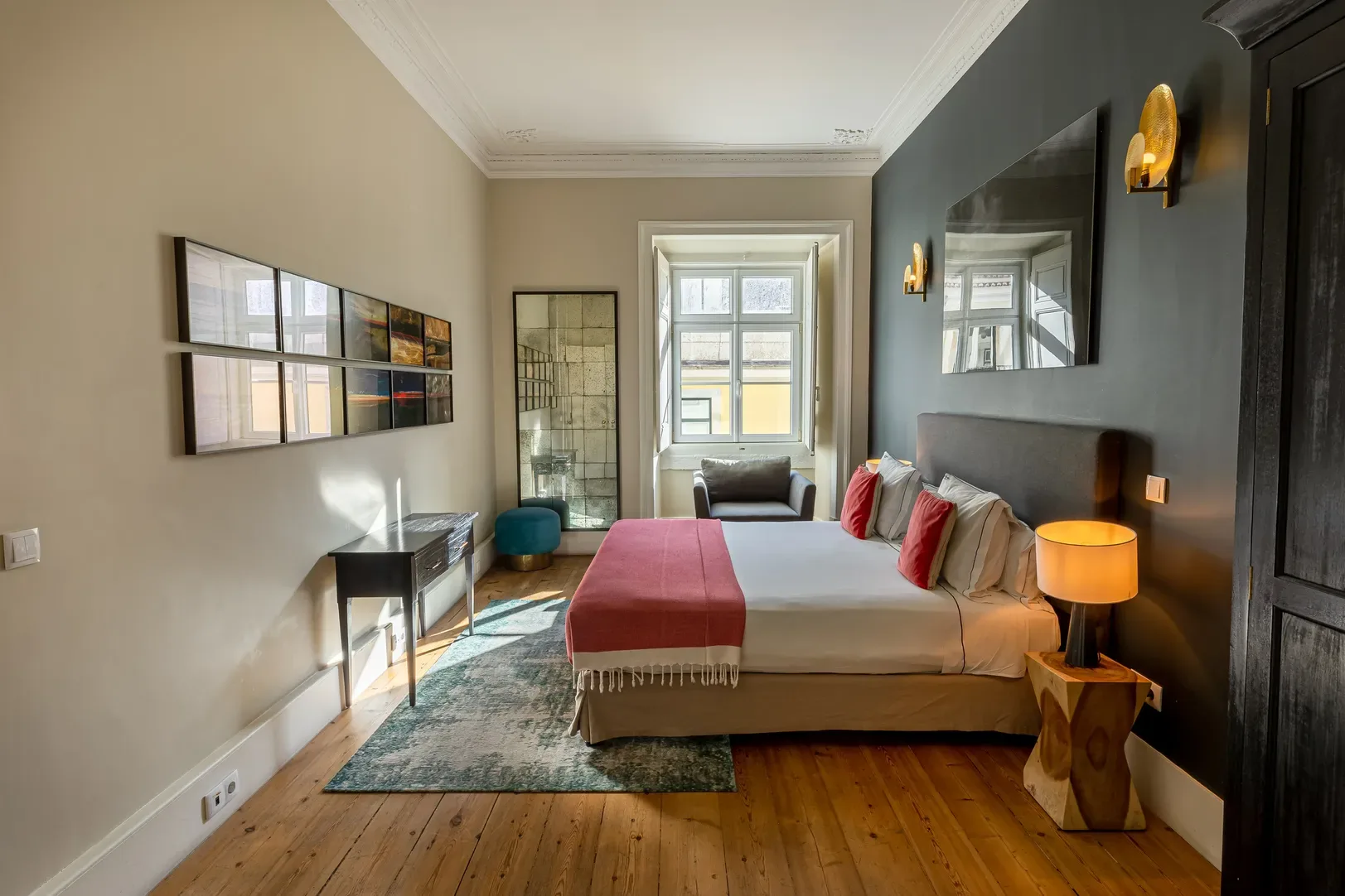 Bedroom with a large bed and armchair.