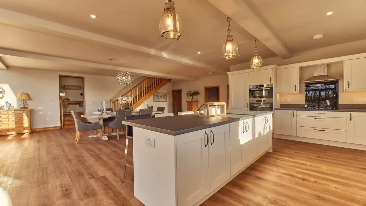 An open-plan kitchen and dining area with a large central island.