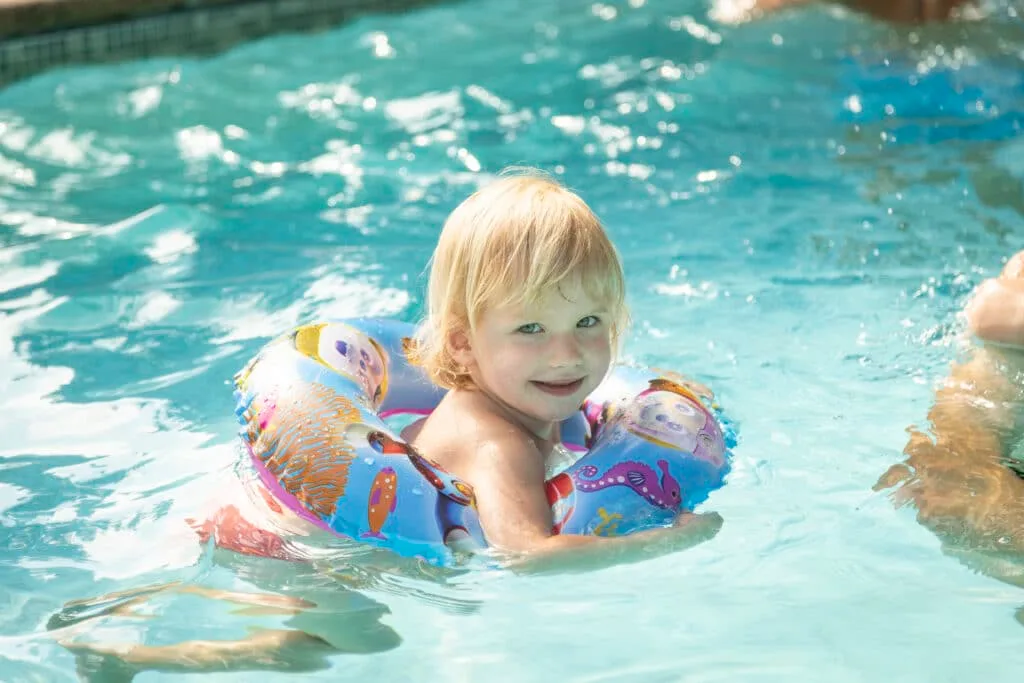 Guest swimming in the hotel pool