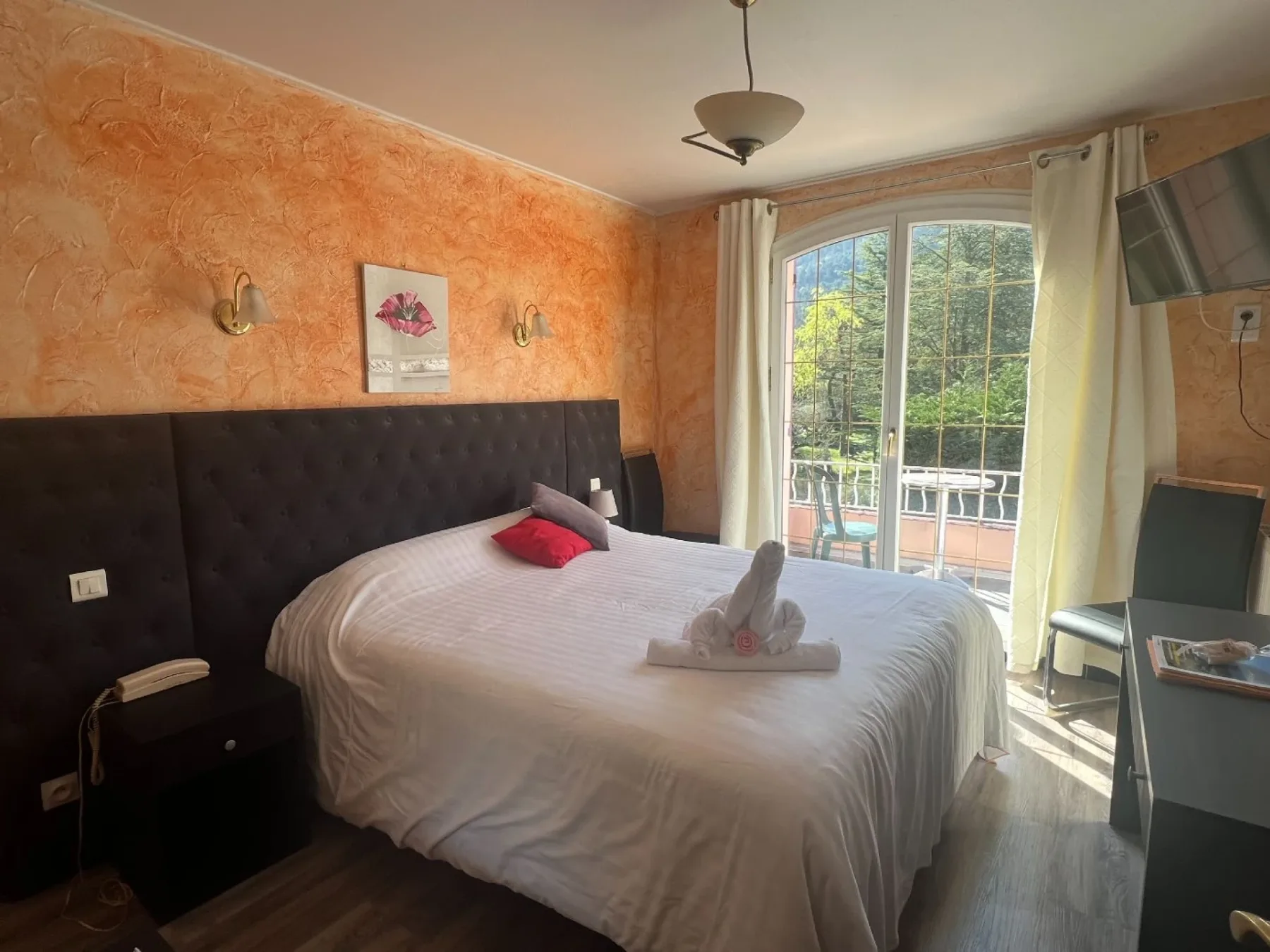 Foto de la galería de habitaciones del hotel