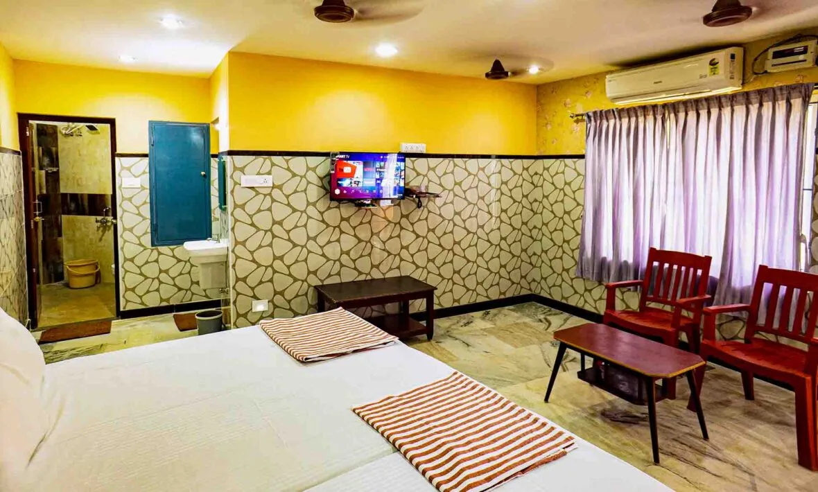 Habitación clásica con cuatro camas