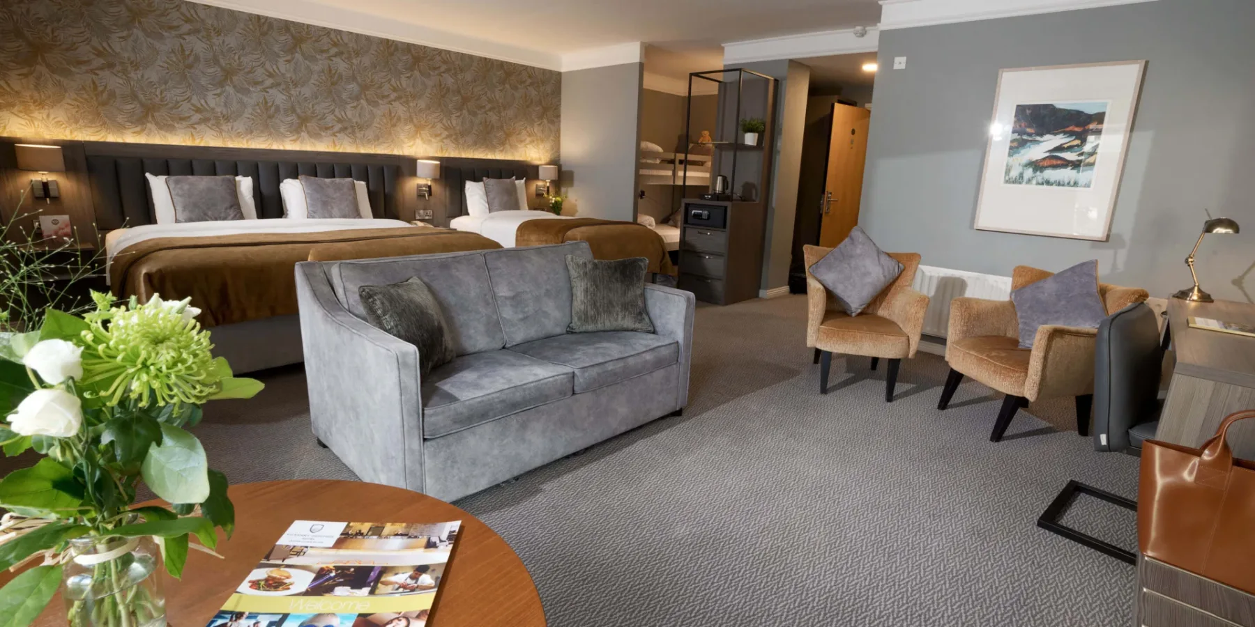 Habitación Club con camas y zona de estar
