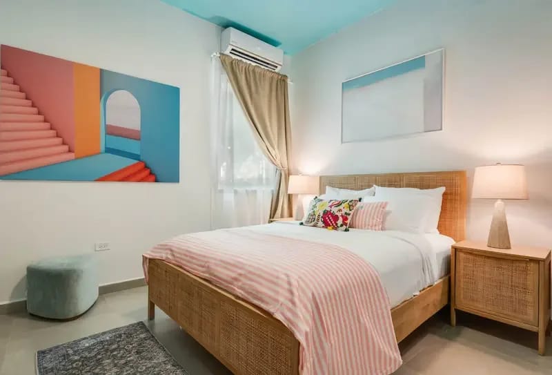 Queen bedroom with A/C and blackout curtains