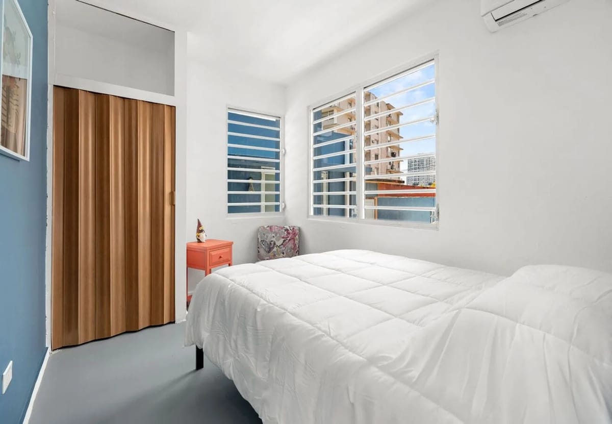 Third queen bedroom with closet & reading chair