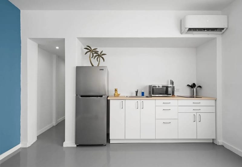 Kitchenette with full-size refrigerator and microwave