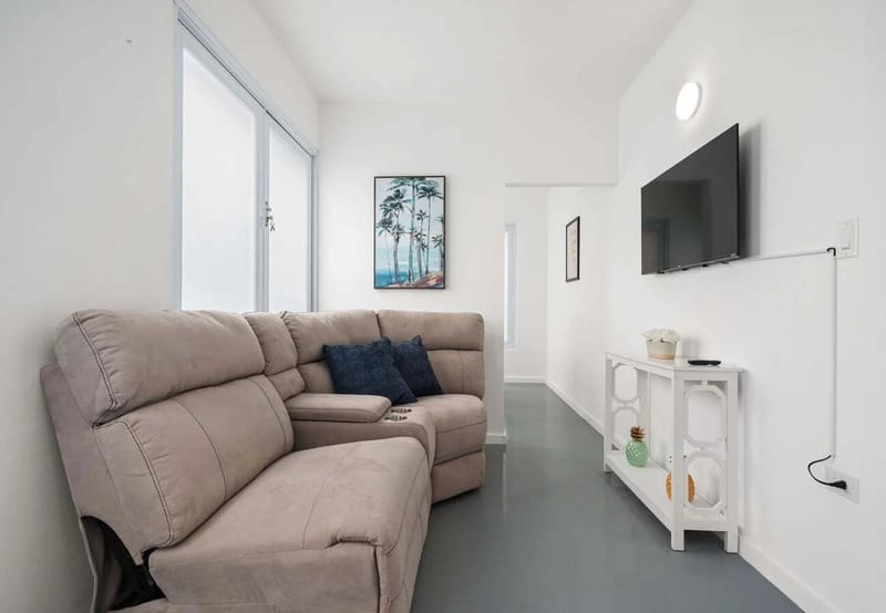 Living room with sectional sofa and smart TV