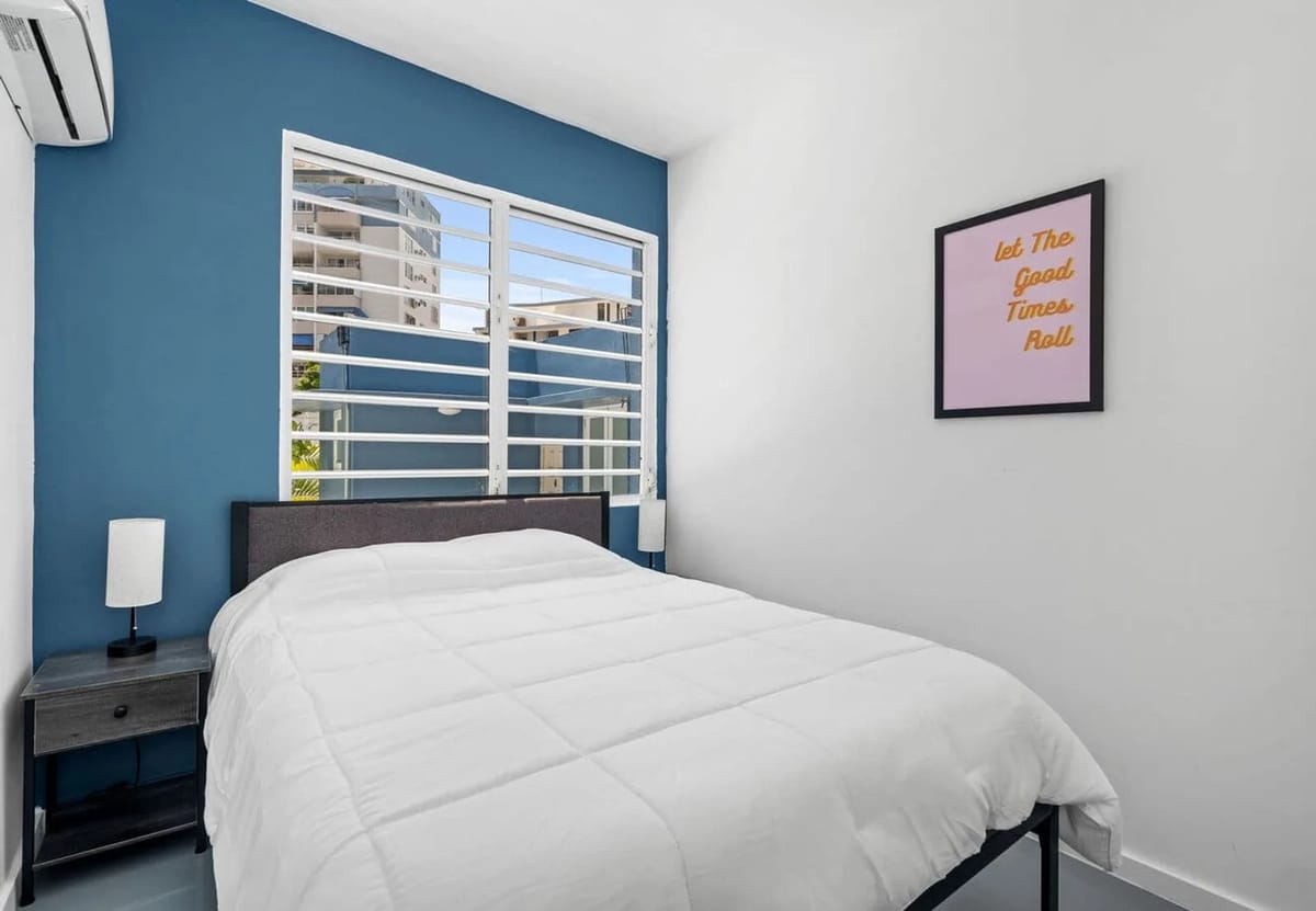 Queen bedroom 1 with split A/C and city view