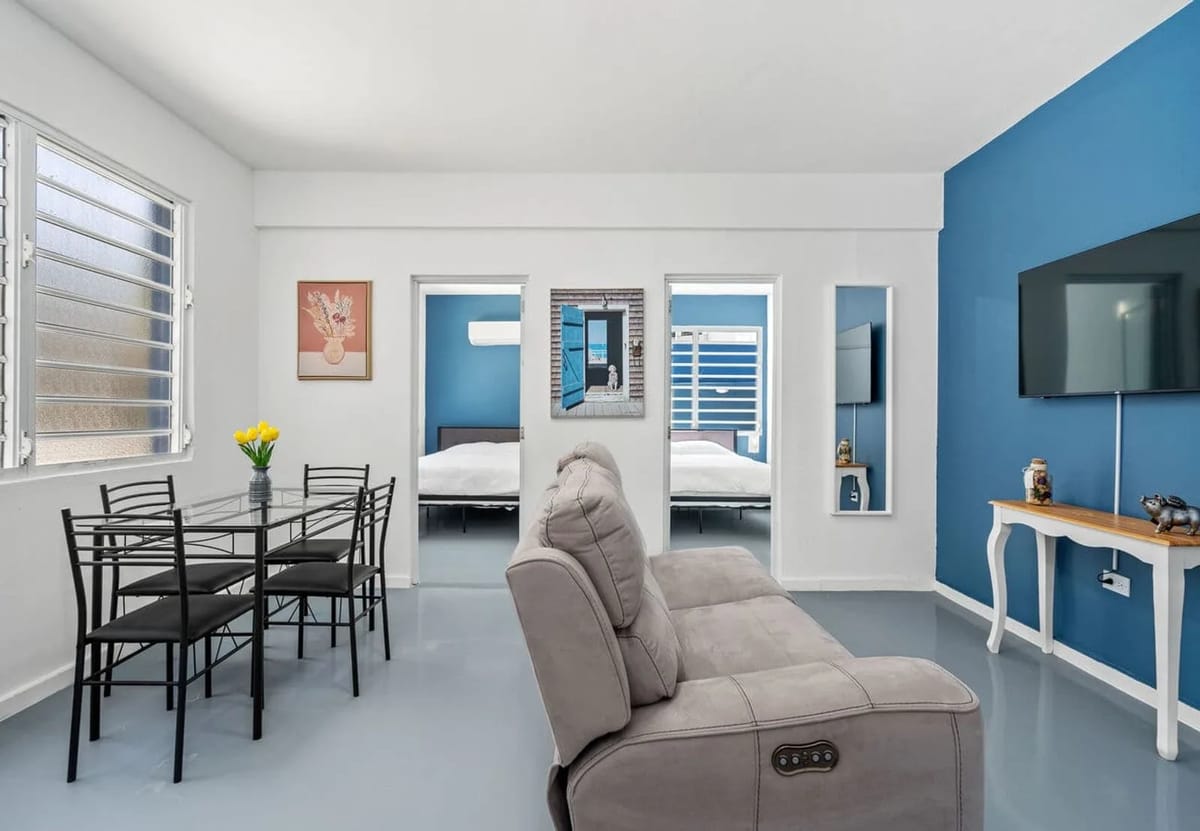 Living room and dining area for four