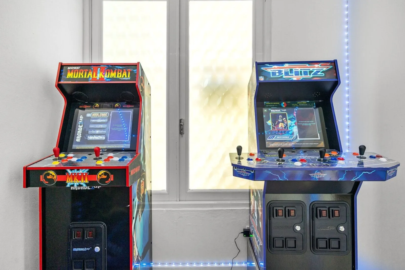 Private retro arcade room with two classic game cabinets