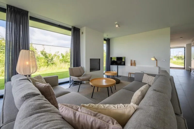 Living room with fireplace and TV