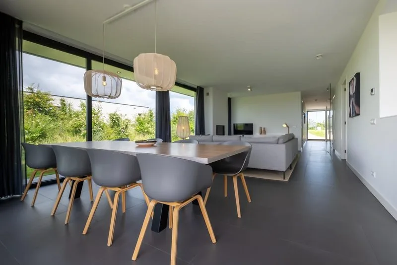 Garden terrace with dining table and loungers
